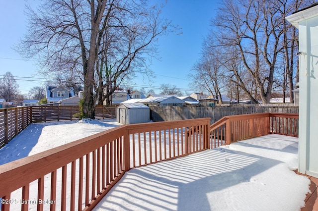 wooden deck with a shed