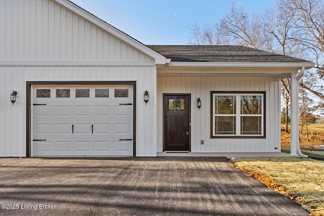 entrance to property with a garage