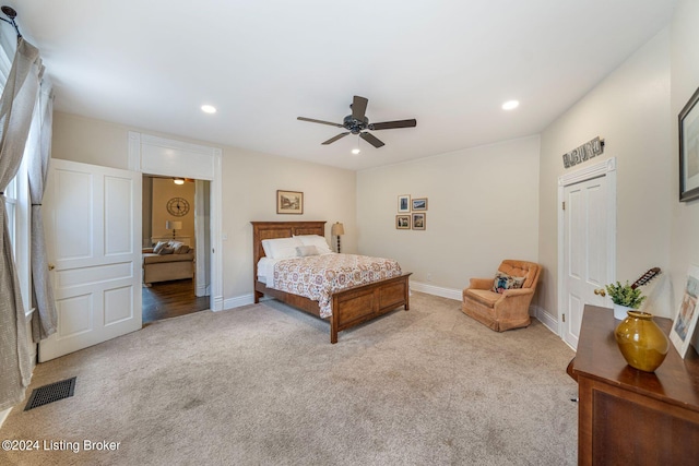 carpeted bedroom featuring ceiling fan