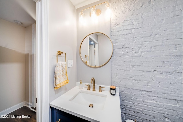 bathroom featuring hardwood / wood-style floors and vanity