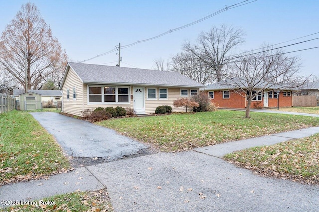 ranch-style house with a front yard