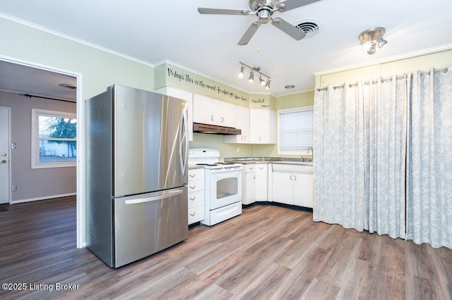 kitchen featuring stainless steel refrigerator, white range with electric stovetop, ceiling fan, hardwood / wood-style flooring, and white cabinetry