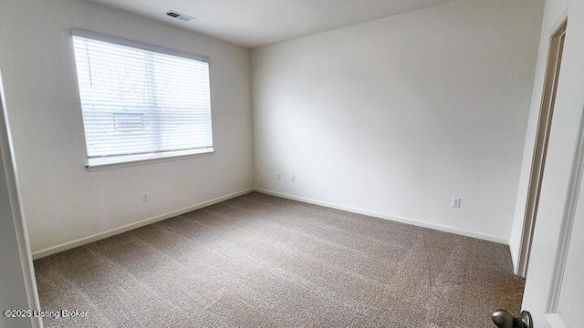 view of carpeted spare room