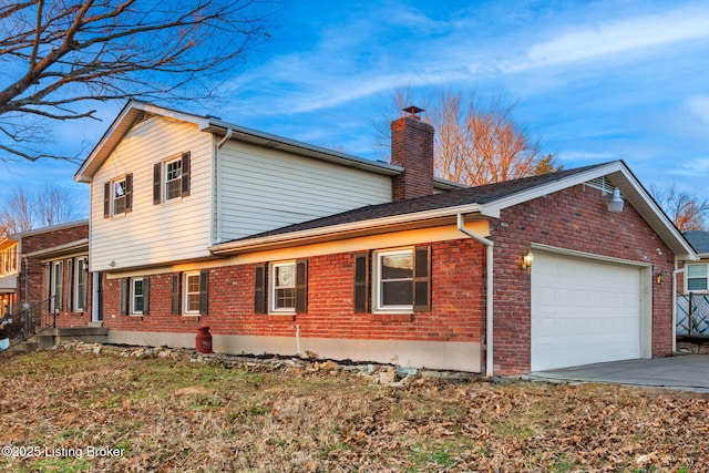 view of home's exterior with a garage