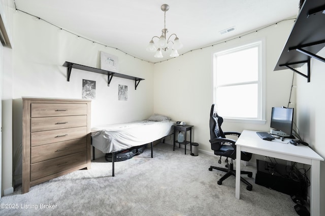 bedroom with light carpet and a chandelier