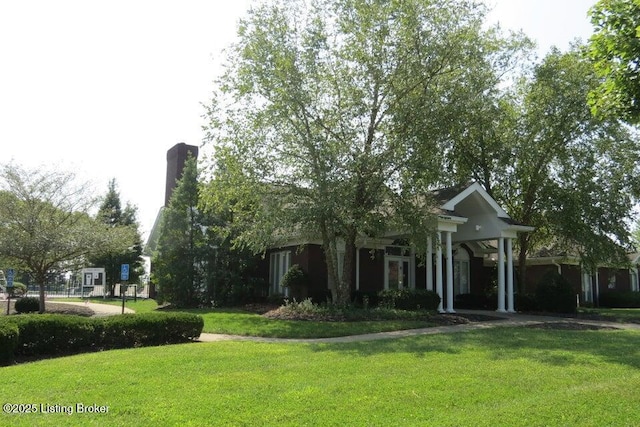 view of front of property with a front lawn