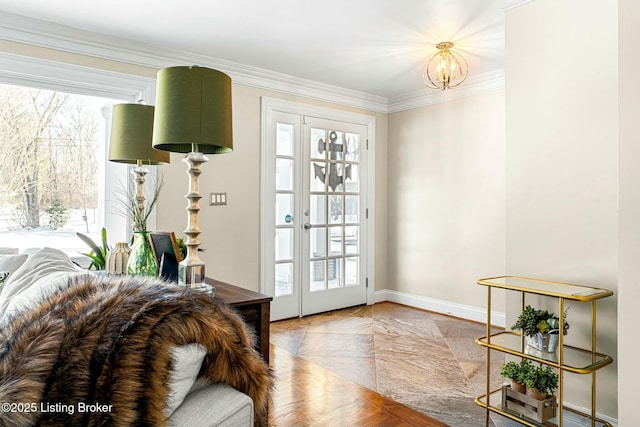 doorway to outside with crown molding and an inviting chandelier