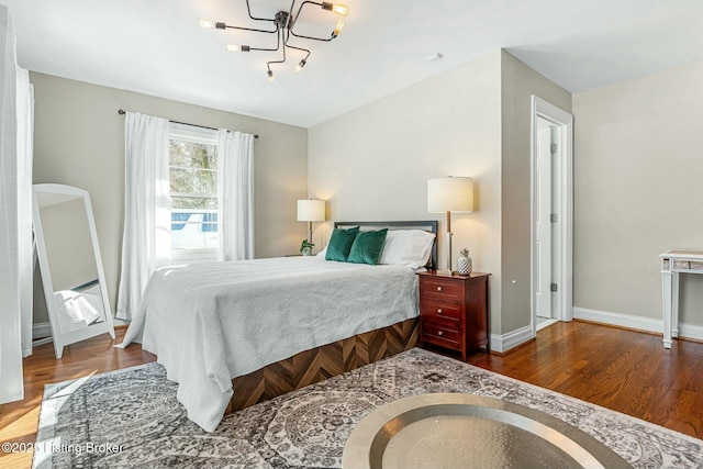 bedroom featuring wood-type flooring