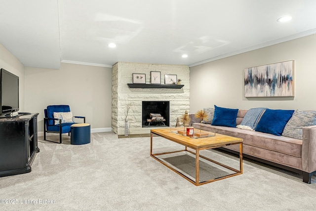 living room featuring a fireplace, crown molding, and carpet flooring