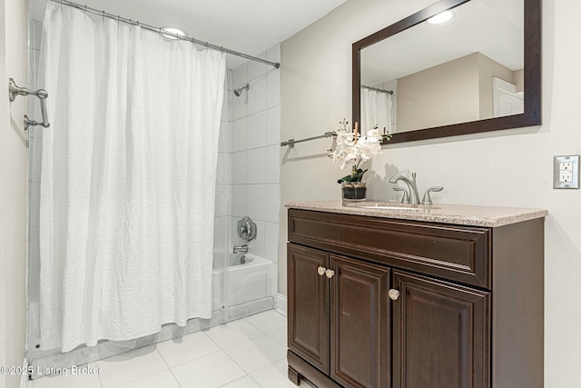 bathroom featuring tile patterned flooring, shower / bath combination with curtain, and vanity