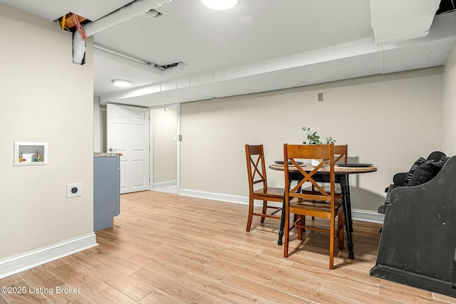 dining area with light wood-type flooring