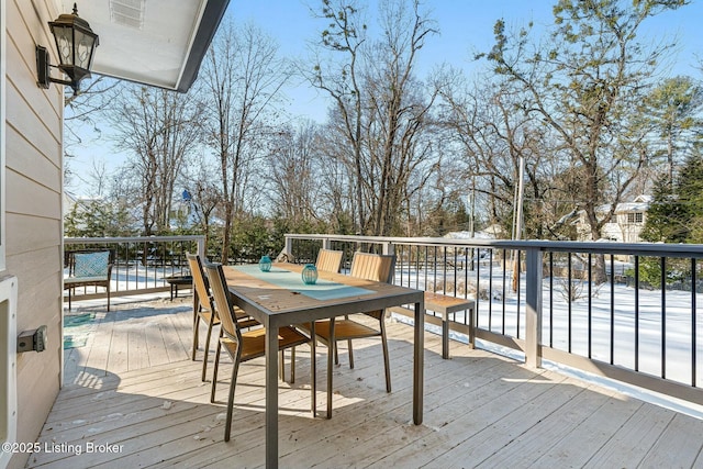 view of snow covered deck