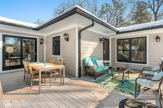 wooden deck with an outdoor hangout area