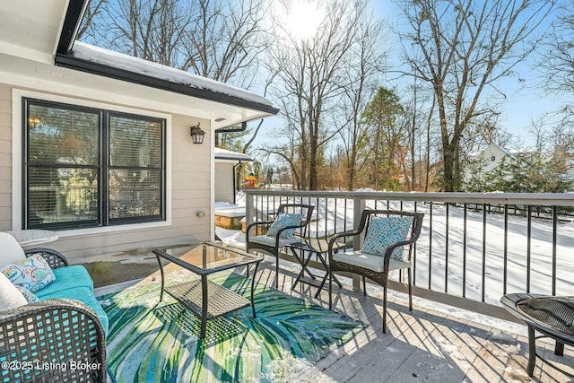 wooden terrace featuring outdoor lounge area