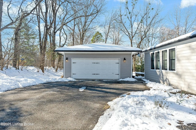 view of snow covered garage