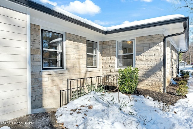 view of snow covered property