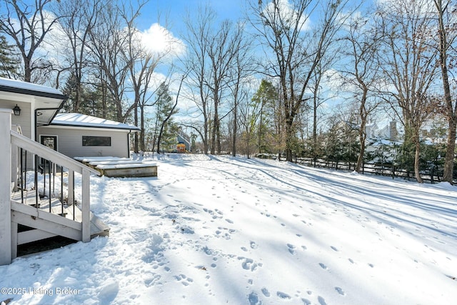 view of yard covered in snow