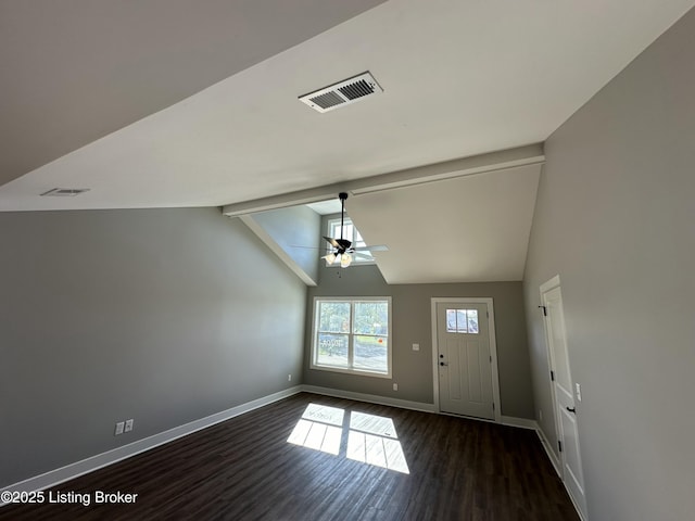 entryway featuring dark hardwood / wood-style floors, ceiling fan, and vaulted ceiling