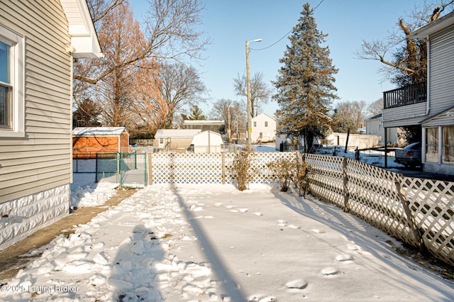 view of yard covered in snow