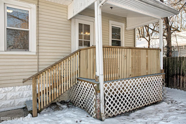 view of snow covered deck