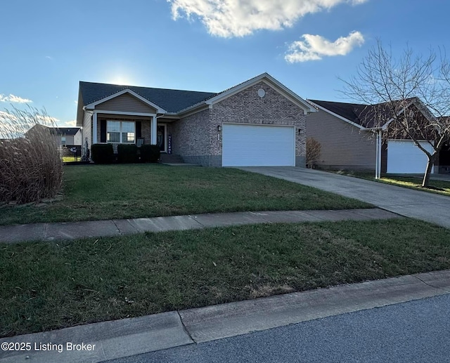 ranch-style home featuring a front yard and a garage