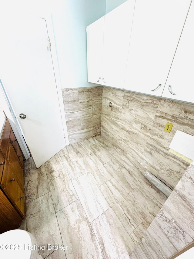 interior space with white cabinetry