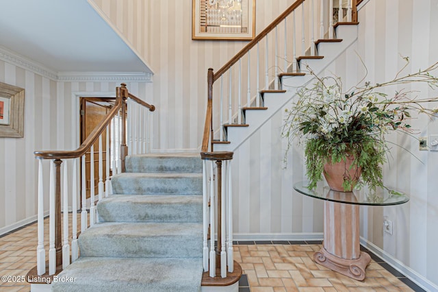 stairs featuring ornamental molding