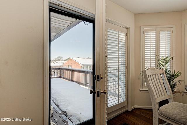 entryway with dark hardwood / wood-style floors