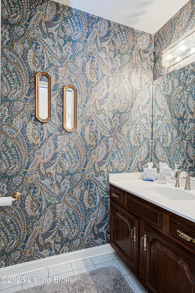 bathroom featuring tile patterned flooring and vanity