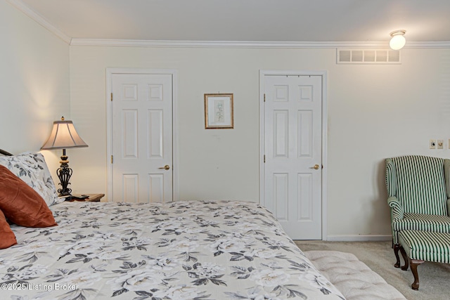 carpeted bedroom featuring crown molding