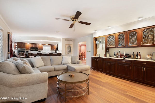 161 Gardiner Lake Rd Unit 161, Louisville, KY 40205 - living area with crown molding, bar, light wood-type flooring, and ceiling fan