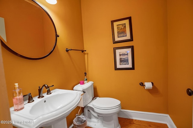 bathroom with sink and toilet