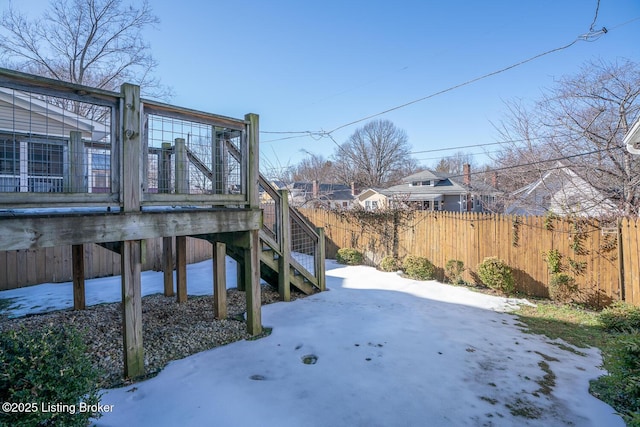 view of yard covered in snow