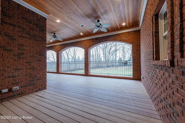 wooden deck with ceiling fan