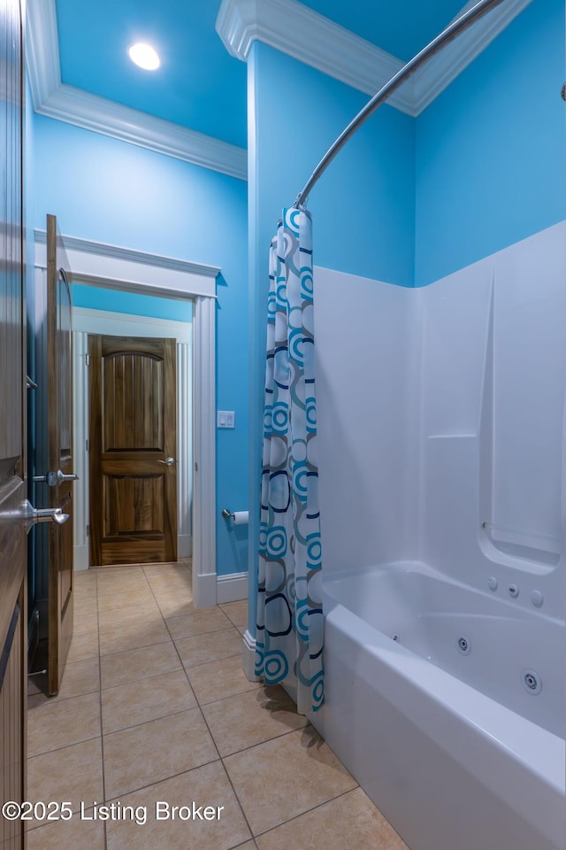 bathroom featuring crown molding, tile patterned floors, and shower / bath combo with shower curtain