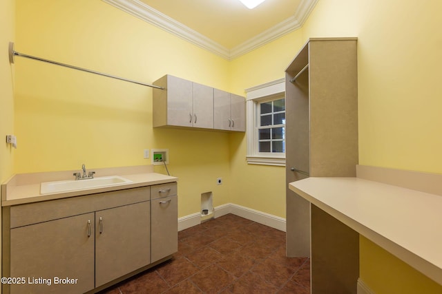 washroom with sink, cabinets, washer hookup, crown molding, and electric dryer hookup