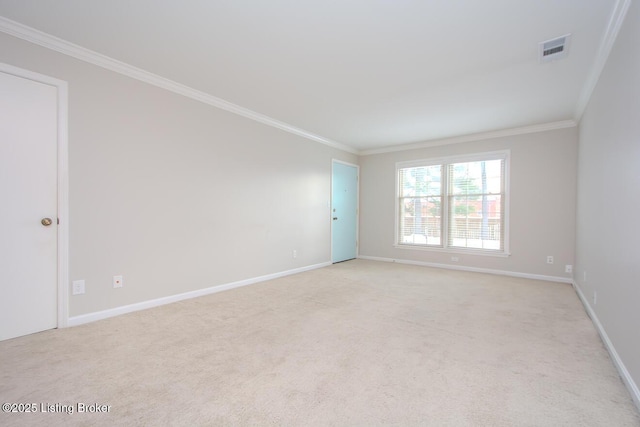 unfurnished room featuring light carpet and ornamental molding