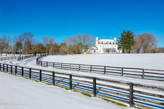 view of yard covered in snow