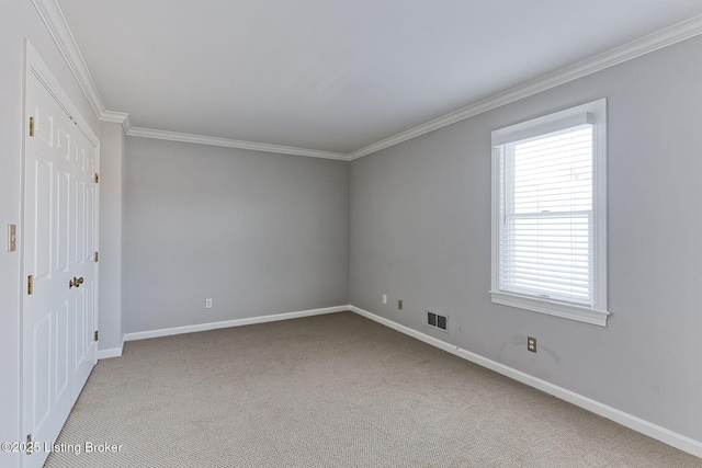 unfurnished bedroom with crown molding and light carpet