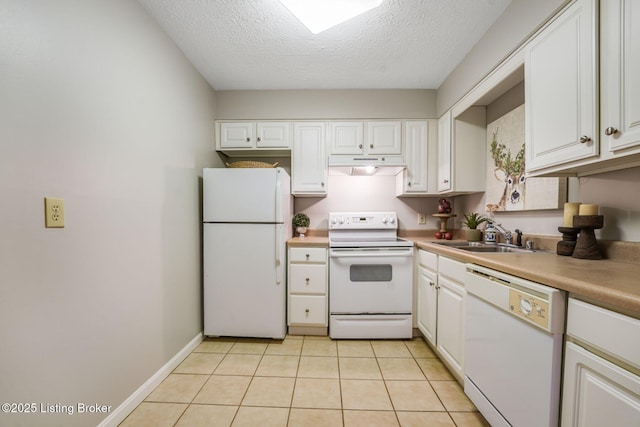 kitchen featuring white cabinetry, sink, a textured ceiling, and white appliances