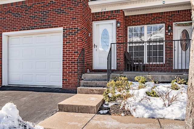 entrance to property with a garage