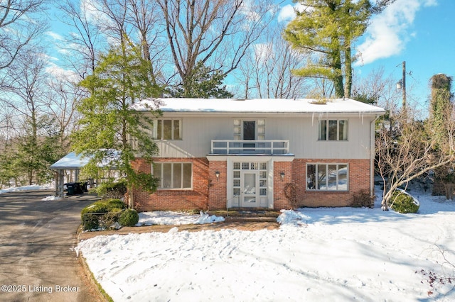 view of front property with a balcony