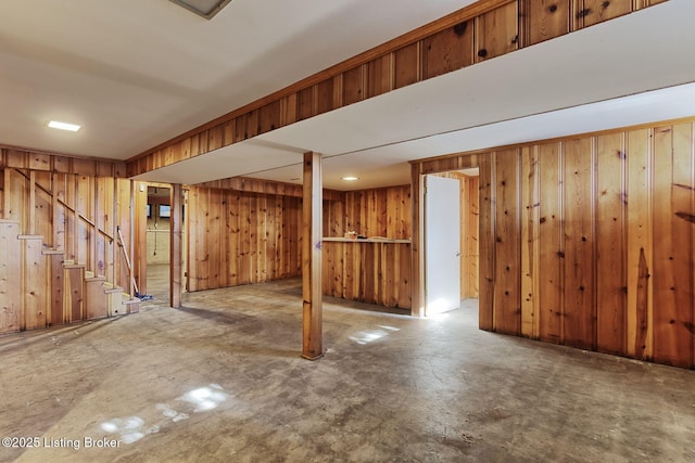 basement with wood walls