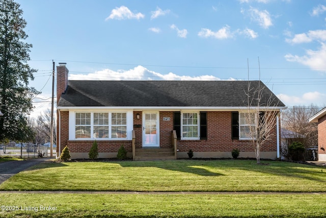 ranch-style house with a front yard