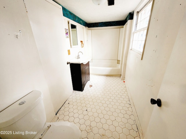 full bathroom with vanity and toilet