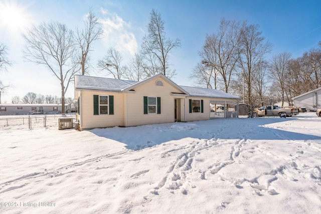 view of snow covered house