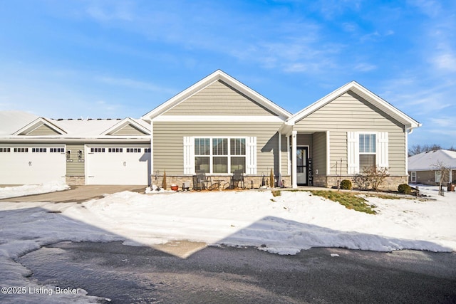 view of front of property with a garage