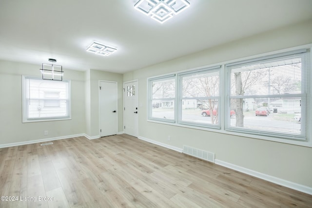 empty room featuring light hardwood / wood-style floors