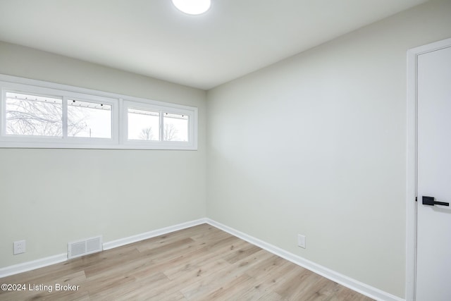 unfurnished room featuring light hardwood / wood-style flooring