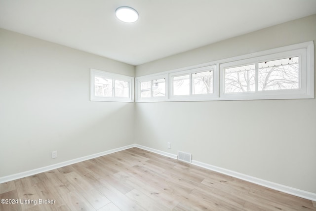 empty room with light wood-type flooring